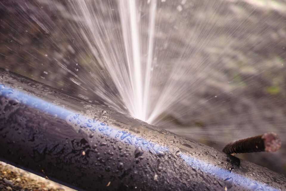 Detail of a pipe bursting water.
